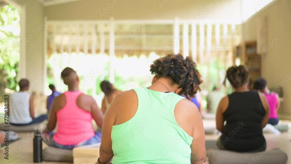 Group of black women doing yoga Group of black women doing yoga