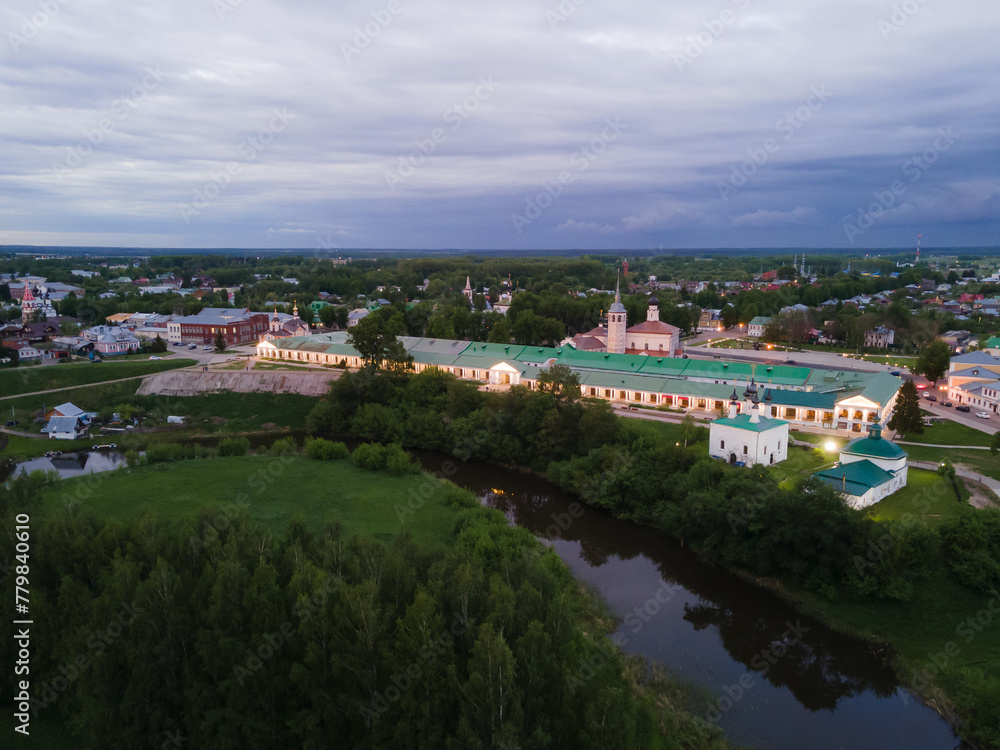  Top view of the Church of the Kazan Icon of the Mother of God, the market square and Trade Row in Suzdal, Russia