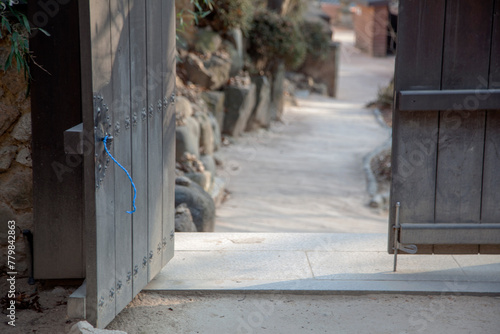 Photography View of the wooden door and the footpath
