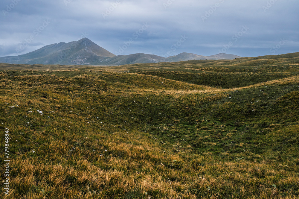 landscape inside Campo imperatore during an autumnal cloudy day, Parco nazionale del Gran Sasso, L'Aquila, Italy