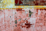 Old wall, peeling ocher and uellow paint colorful texture