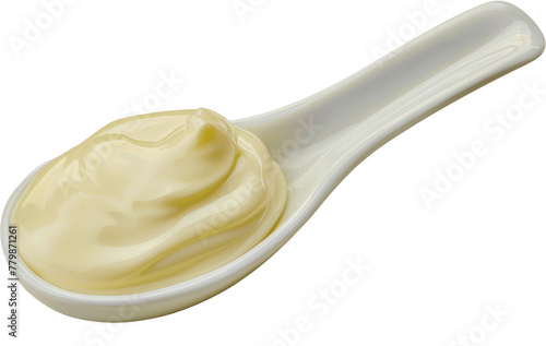 Creamy mayonnaise swirl on spoon cut out on transparent background