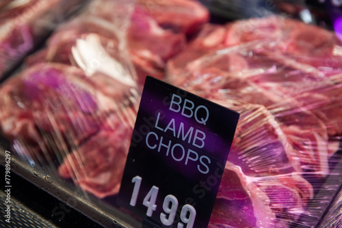 bbq lamb chops in a butchers shop cabinet photo