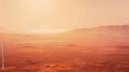 a sandy area with mountains in the background