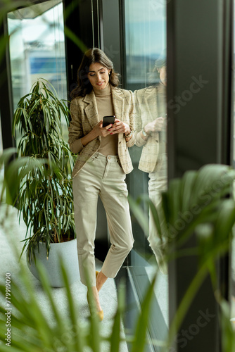 Elegant woman clad in chic ...