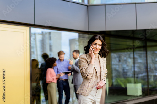 Elegant businesswoman engag...