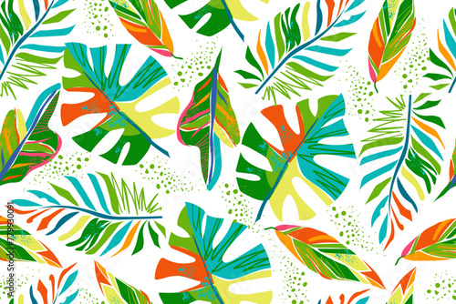 Colorful tropical leaves on a white background seamless pattern. Leaves of monstera, palm, croton, calathea triostar. Modern summer pattern. Vector illustration. © Oksana_Skryp
