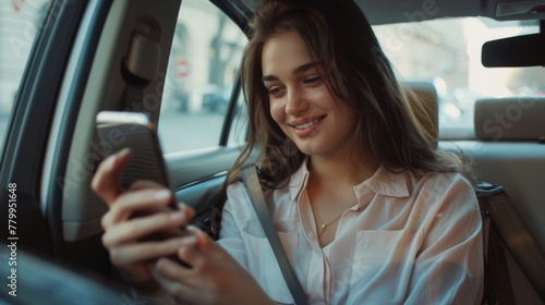 Woman Texting in Car Ride photo