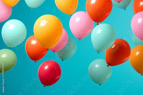 An HD-captured image of colorful balloons floating against a solid background, creating a vibrant and joyful scene.