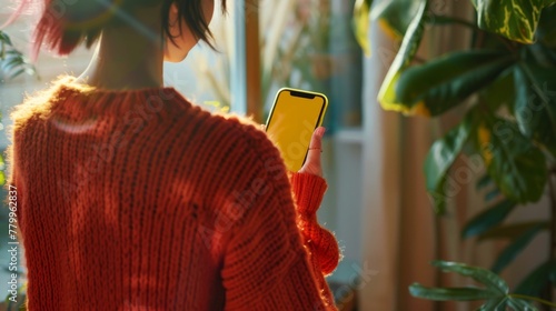 A Woman Holding Smartphone photo