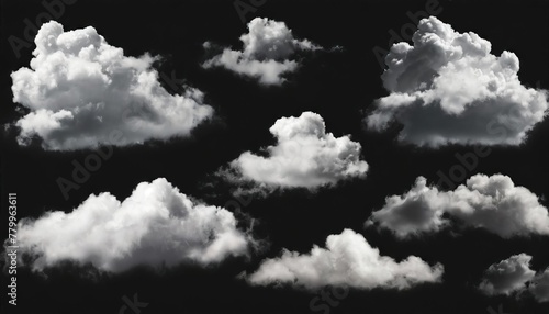collection of whtie clouds isolated on black background photo