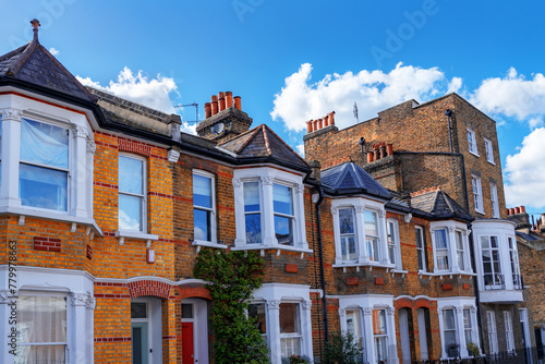 Front view of traditional Victorian and Georgian brick houses in Greenwich area in South - East London, United Kingdom © cristianbalate