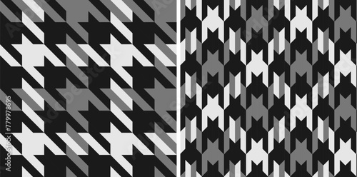 Black white seamless a large checked pattern with notched corners suggestive of a canine tooth.
