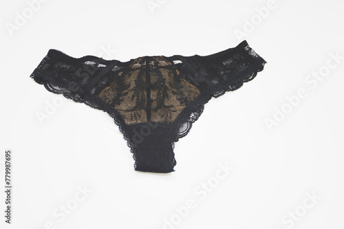 Lingerie. Black women's sexy lace panties, on a white background. Fashionable women's underwear