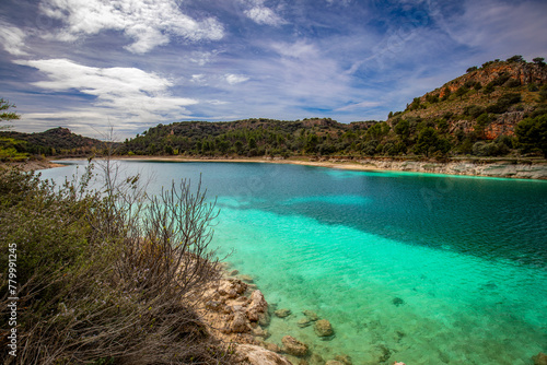View of the Lengua lagoon in the Lagunas de Ruidera  Albacete  Castilla La Mancha  Spain  with an intense color and little water due to the pressing drought