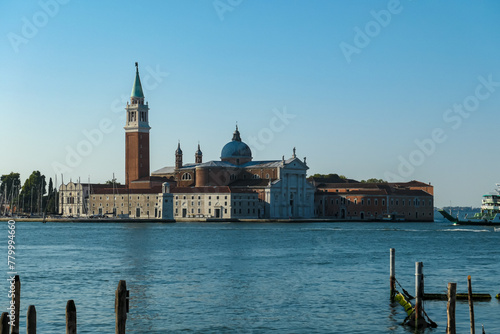 Scenic view of church on the Island of San Giorgio Maggiore, Venice, Veneto, Northern Italy, Europe. Perspective from San Mark Square. Soft light in tranquil atmosphere. Boat trip in Venetian lagoon