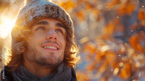   A close-up of a person wearing a hat and a scarf around their neck © Jevjenijs