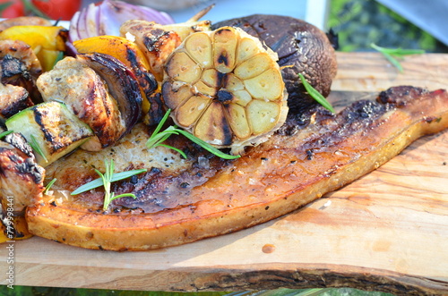 beautiful background of close-up of grilled food on a wooden board