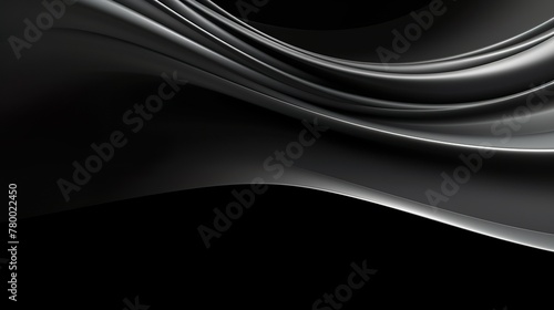 Picture of elegant swirling folds of black satin in a dark environment, creating a luxurious and dramatic effect photo