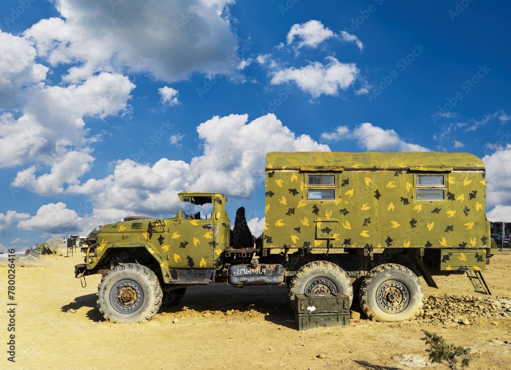 Obraz premium A damaged military truck on the battlefield. military technics.