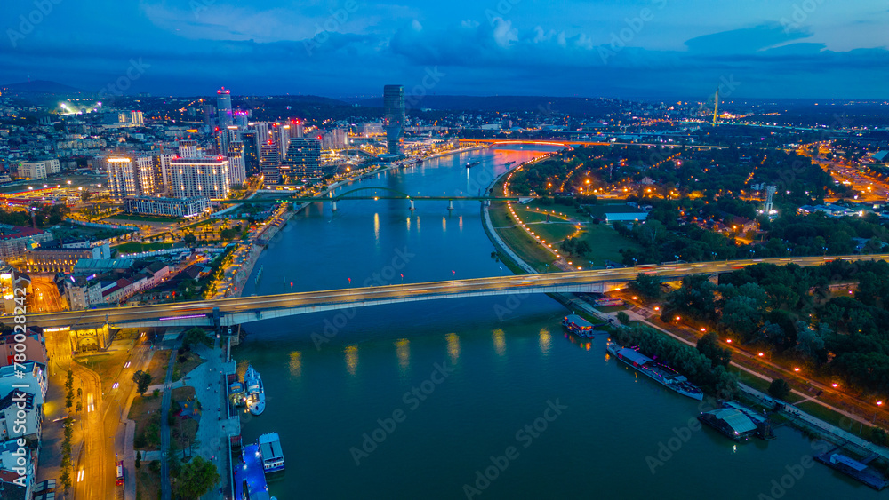Fototapeta premium Sunset over Downtown Belgrade viewed behind the Sava river in Se