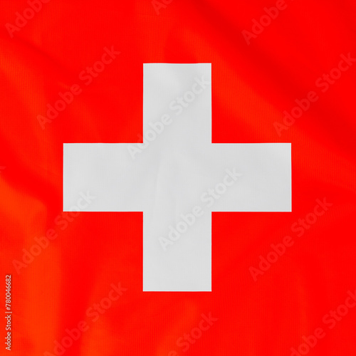 Obraz na płótnie Flag of Switzerland (Swiss Confederation) with natural material creases as a background w salonie