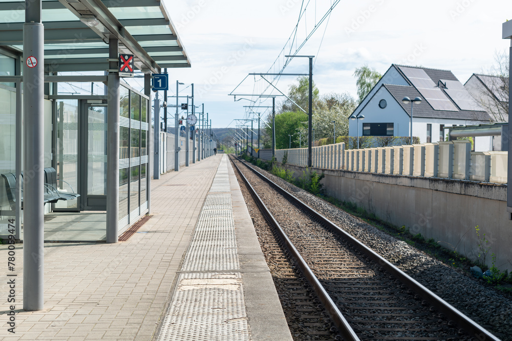 Fototapeta premium railway station in the city,stop at the railway station, railway traction, traveling, station in the city