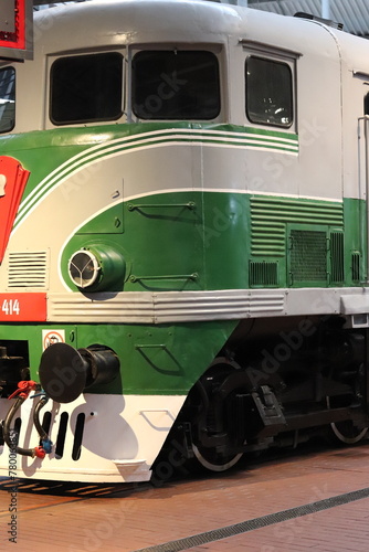 Vintage locomotive retro train. Beautiful locomotive in green and red colors. photo