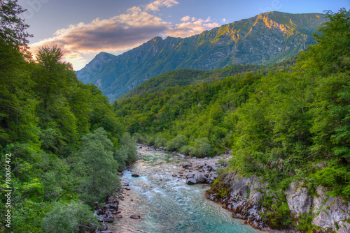 Sunset view over Soca river in Slovenia photo