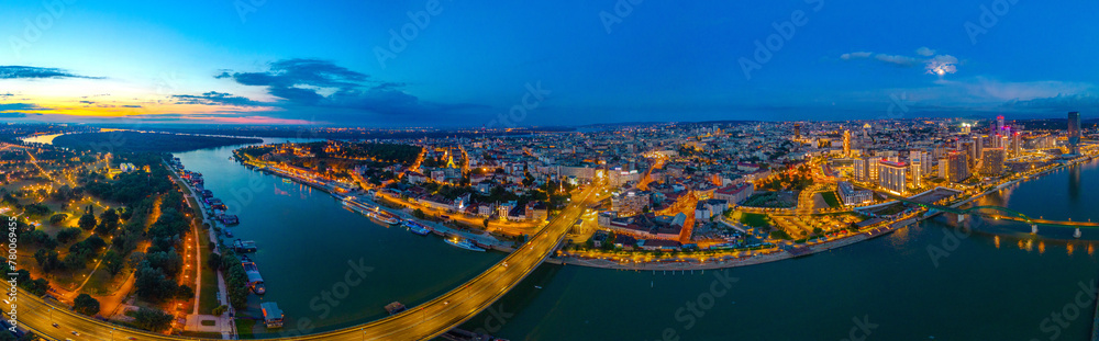 Fototapeta premium Sunset over Downtown Belgrade viewed behind the Sava river in Se