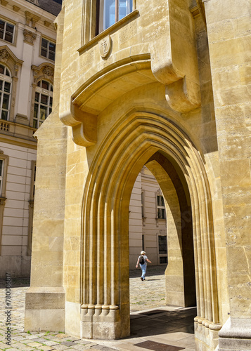 Photography Solo Traveler through Arch in Vienna Austria