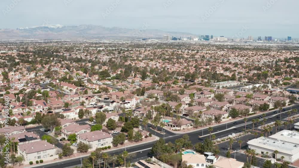 Aerial pullback wide shot of Henderson Las Vegas suburban area with city skyline Aerial pullback wide shot of Henderson Las Vegas suburban area with city skyline