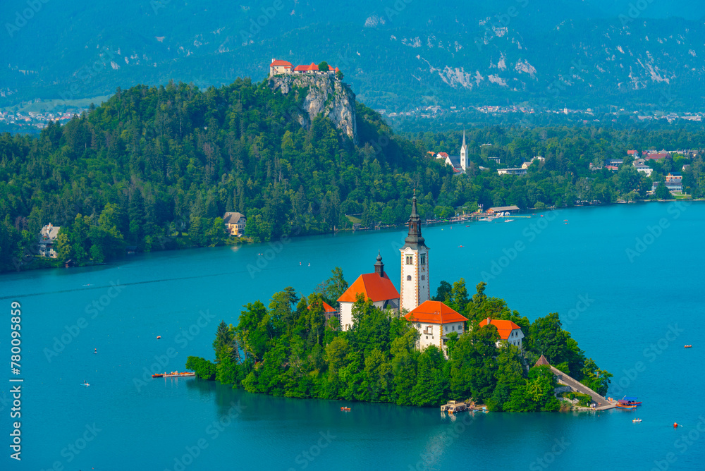Assumption of Maria church and Bled Castle at lake Bled in Slove - obrazy, fototapety, plakaty 