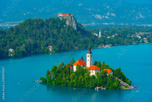 Assumption of Maria church and Bled Castle at lake Bled in Slove photo