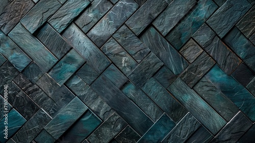 Herringbone pattern of dark slate tiles with subtle blue hues. Textured geometric background.