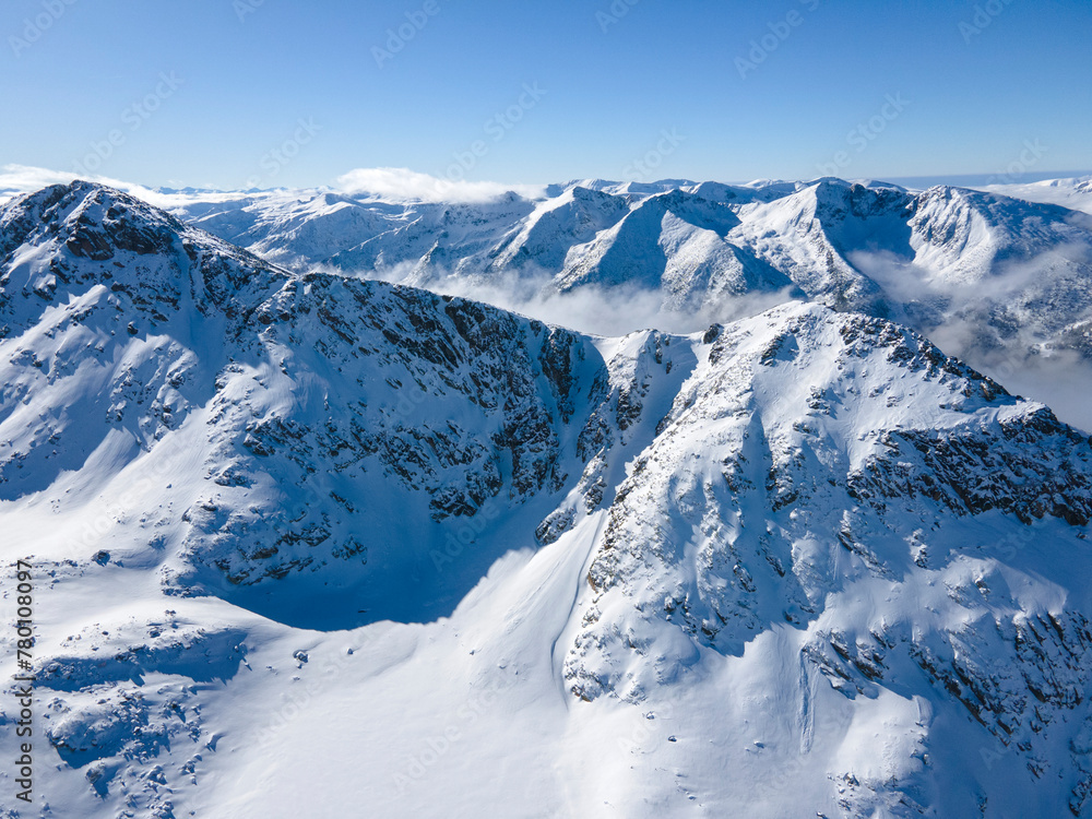 Amazing Aerial Winter view of Rila mountain near Musala peak, Bulgaria Amazing Aerial Winter view of Rila mountain near Musala peak, Bulgaria