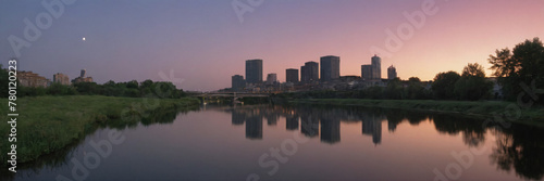 Sunset and Greater City in the background of a beautiful river lake © Mr.Pancho Store