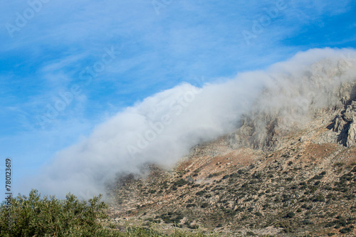 Panoramic view from road to Antequerra National Park, limestone rock formations and known for unusual karst landforms in Andalusia, Malaga, Spain.