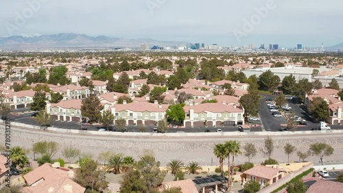 Aerial pullback shot of Henderson Las Vegas residential suburb with city skyline