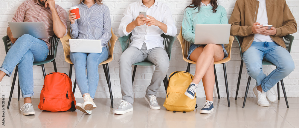 © Pixel-Shot - Students with modern devices studying online indoors © Pixel-Shot - Students with modern devices studying online indoors
