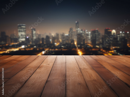 Blurred city lights form the backdrop for an empty wooden table in this mockup