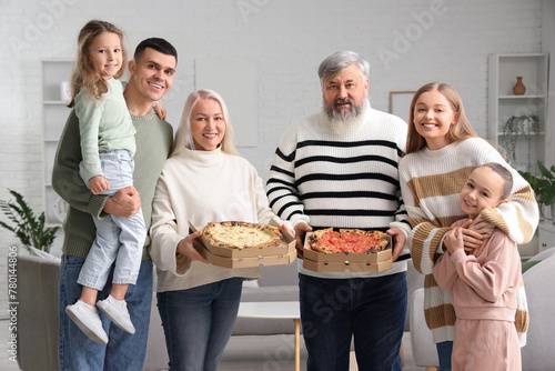 Big family with tasty pizza...