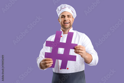 Male chef with hashtag on l...