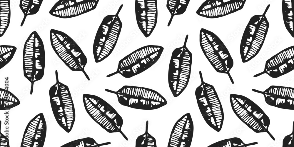 Black and white tropical seamless pattern with hand drawn ink banana leaves. Monochrome grunge textured exotic floral elements print for textile, wrapping paper, cover, surface, wallpaper Black and white tropical seamless pattern with hand drawn ink banana leaves. Monochrome grunge textured exotic floral elements print for textile, wrapping paper, cover, surface, wallpaper