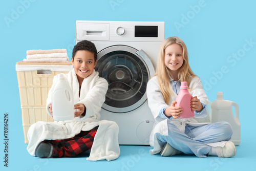 Children with bottles of la...