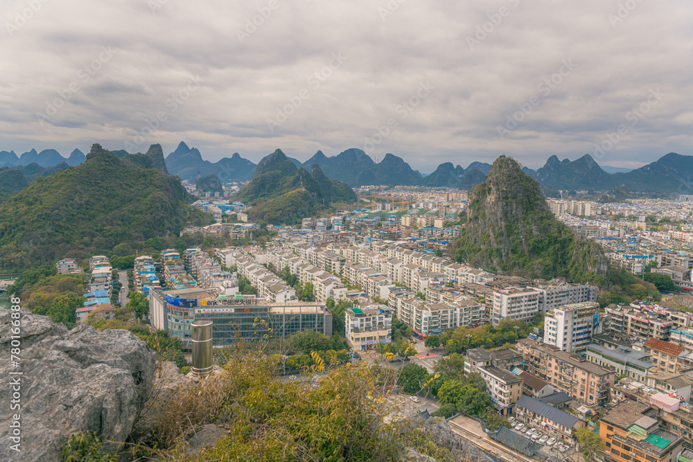 aerial of Guilin town with sunset glow ,beautiful karst mountain scenery,China