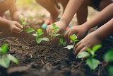 Children and parents plant small trees on black soil together as a world record concept in vintage tones.