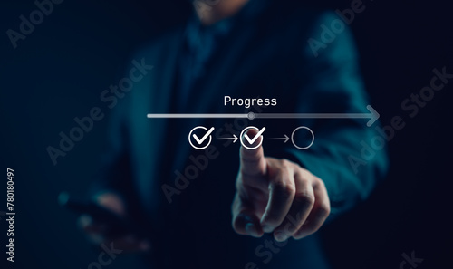 Businessman or manager touching on checklist to tick correct mark with progressive loading status to remind work task progressive for project develop management and tracking concept.