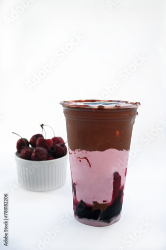 Panoramic still life of ice cream slush frozen colorful frozen fruit granita drinks flowing into takeaway plastic cups with ice cream straws flavor photo