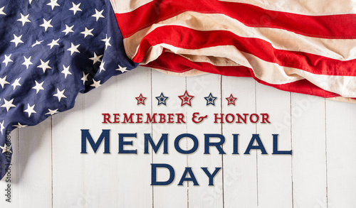 Happy Memorial day concept made from american flag and the text on white wooden background.